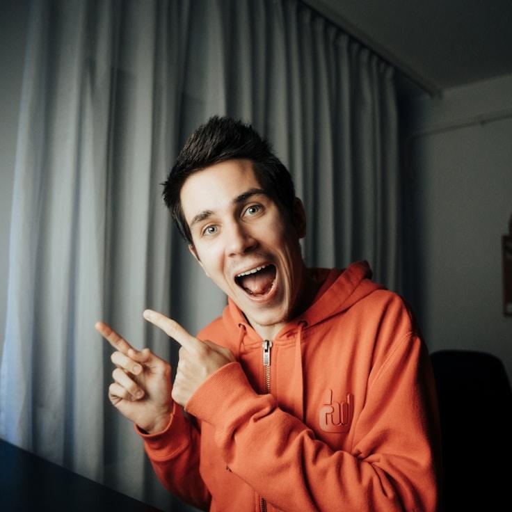 Alex Chen, Lead Design Curator at QuietAnchorBay, reviewing corporate floral arrangements